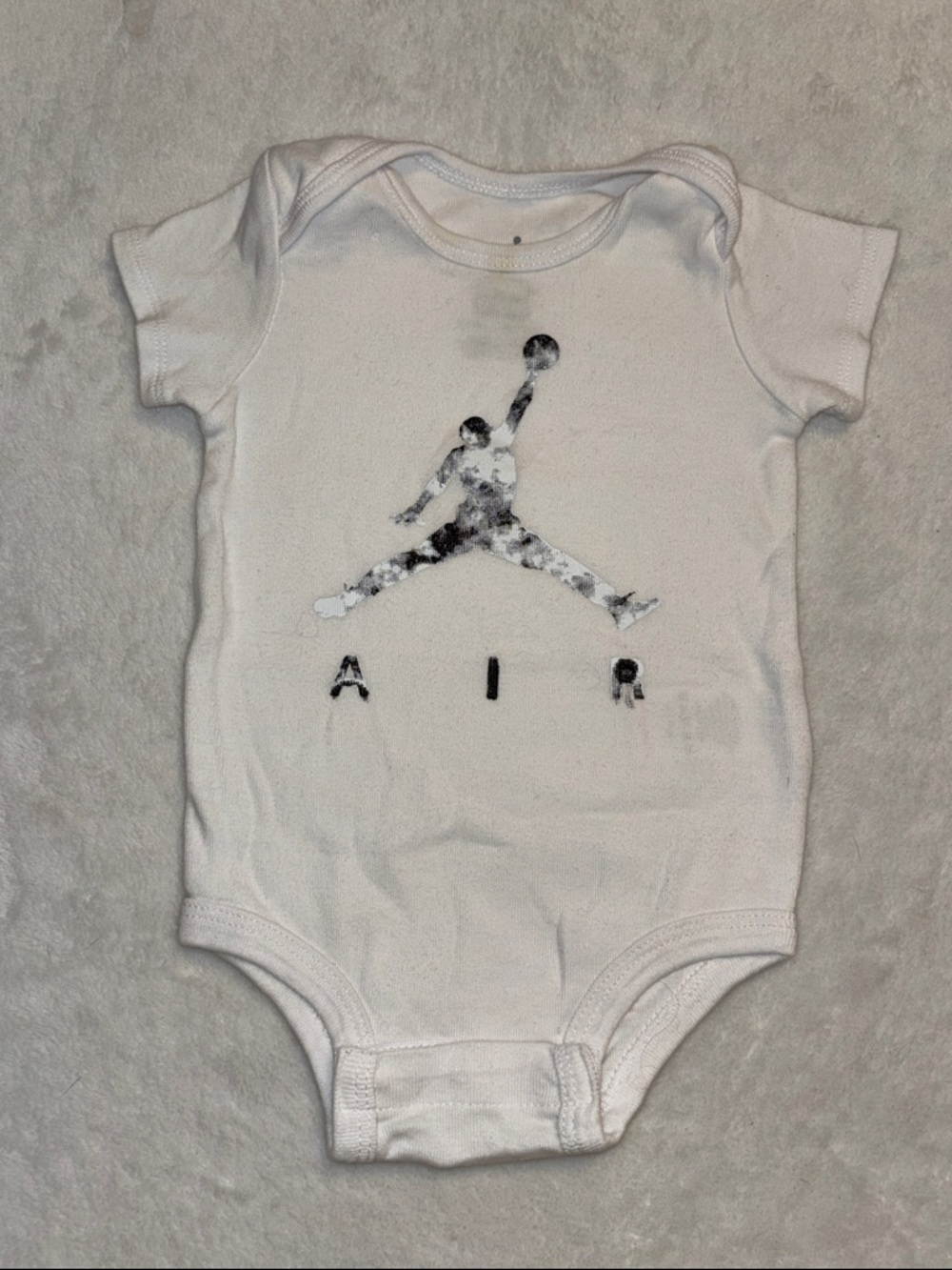 Nike Jordan White Baby One-Piece Bodysuit with Air Logo